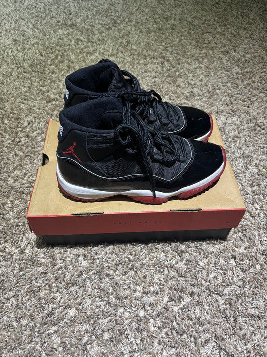 Air Jordan 11 Retro "Bred" Black/Red - Size 7'5 (Used)