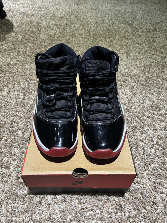 Air Jordan 11 Retro "Bred" Black/Red - Size 7'5 (Used)